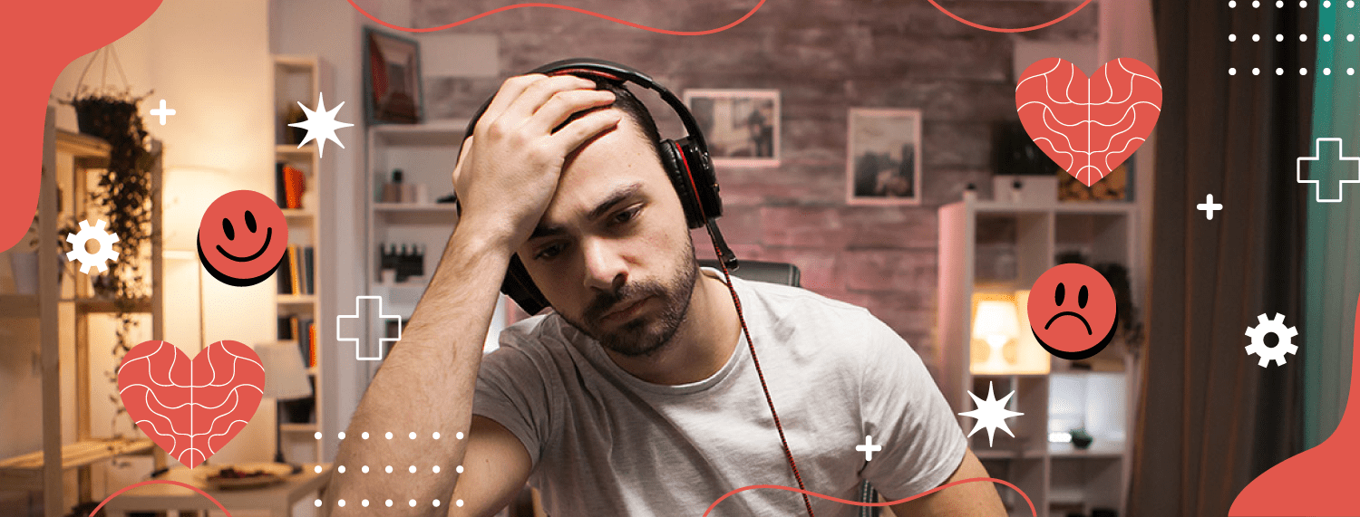 Bearded man playing online video games on his pc and talking with