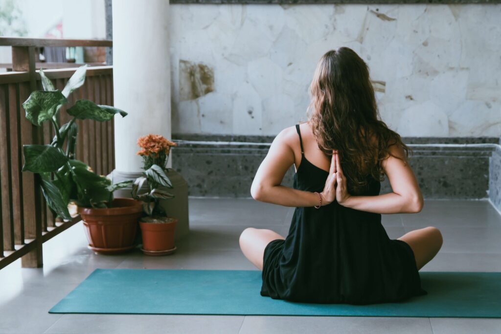 woman doing yoga in the morning